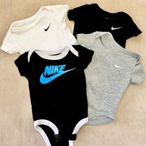 Nike 0-3 month onsie set of 4.